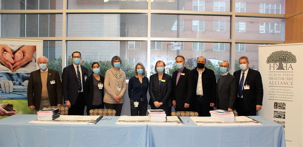 Team member from the HPHA, Stratford General Hospital and SEM Construction pose for photo after signing construction contracts